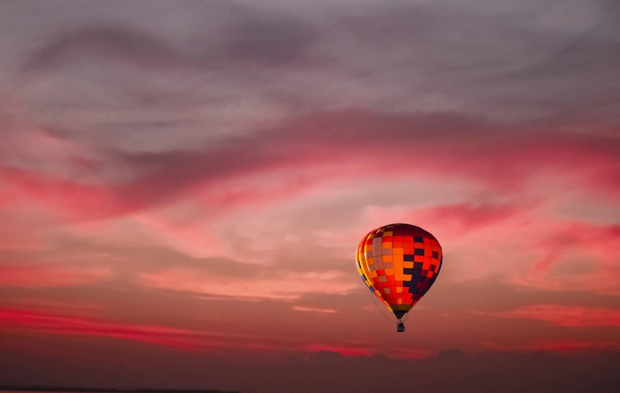 flying multicolored hot air balloon