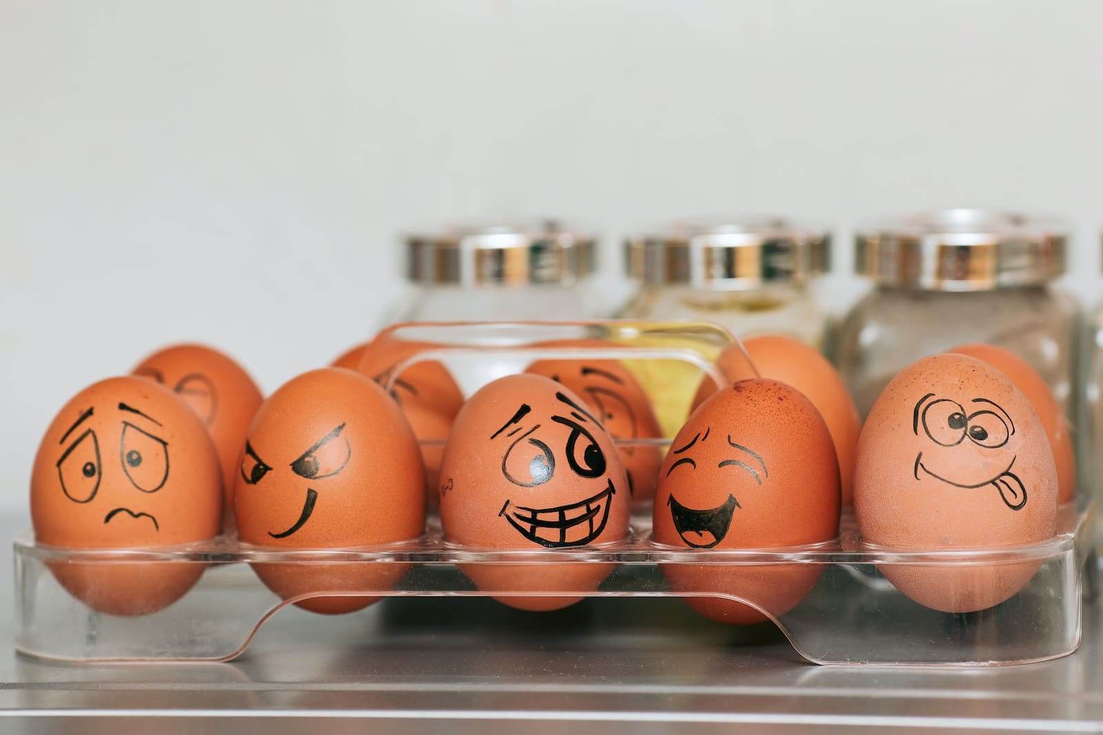 orange and white egg on stainless steel rack